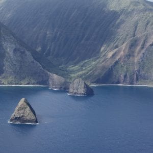 Stunning aerial view of Maui's majestic cliffs and mountain on helicopter tour