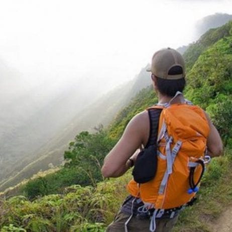 Guest appreciating the beaty of mountains during hiking tour on Maui.