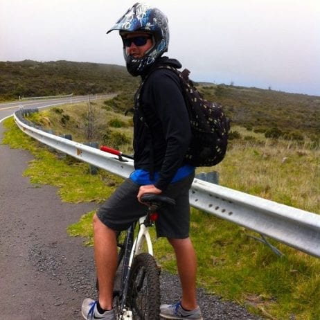 Mountain Riders bike rider resting during Haleakala downhill tour