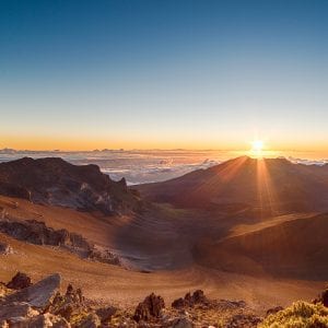 Breathtaking Haleakala sunrise during an exhilarating Maui helicopter tour.