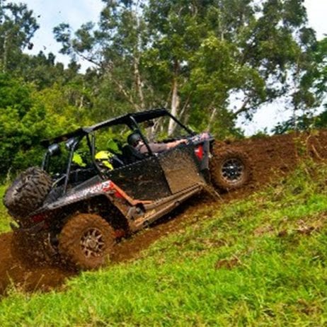 ATV on Maui getting dirty going up a steep grade.